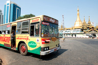 Colorfull bus at city center with Sule Pagoda