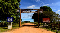 Entrance to a long dirt road to uor first stop